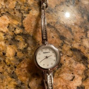 Thin band silver watch